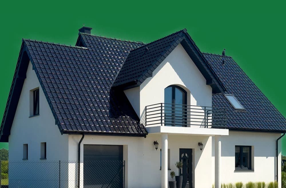 American home with a finished residential roof at dusk, Better Homes roofing and solar.